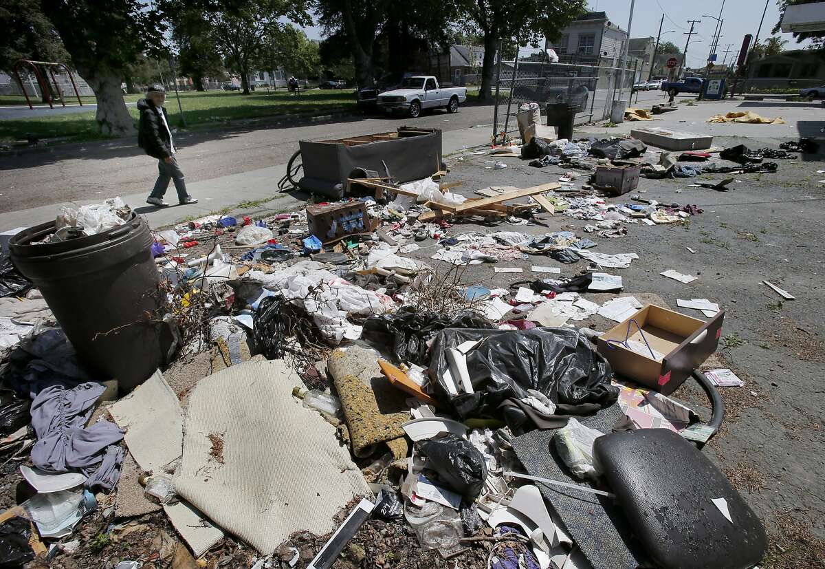 Oakland council looks at donation bins that attract dumpers