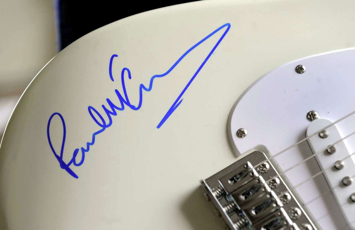 A guitar signed by Paul McCartney will be part of an annual auction at St. Thomas' Episcopal Church on Greenwood Ave. in Bethel, Conn. Saturday, May 3. Photo taken Tuesday, April 22, 2014.