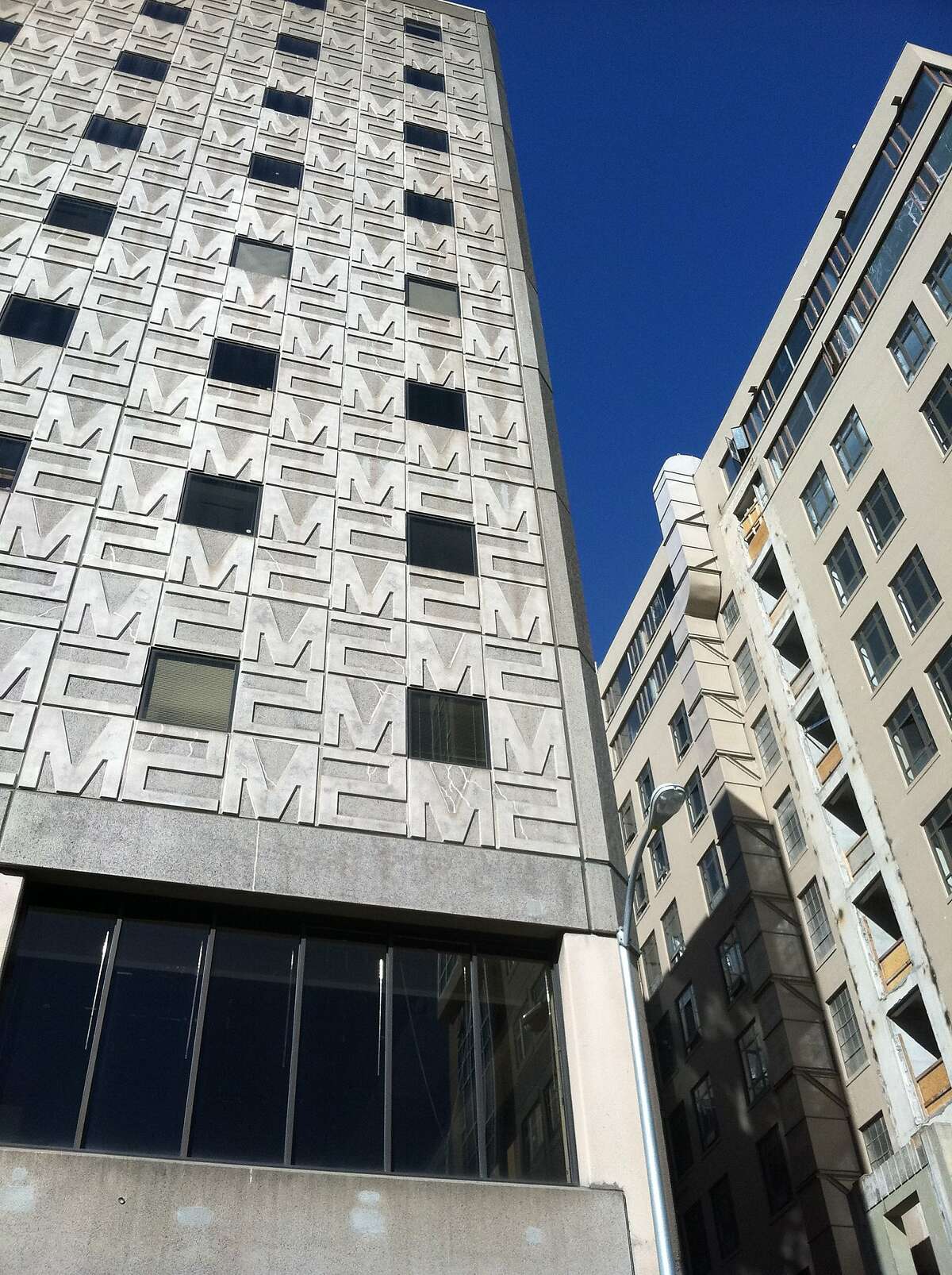 Now in the process of being named 1 10th Street, with a new glass skin, the 1970s addition to the Merchandise Mart was of note mainly for its small windows and logo'd M2 panels.