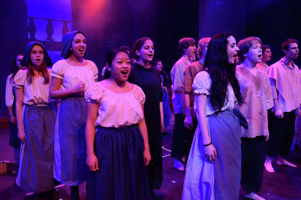 Immaculate High School students rehearse on Tuesday, April 22, 2014 for their presentation of 'Les Miserables' this weekend April 24 and April 25 at 7;00 and April 26 at 1:30 and 7:00. Go to www.immaculatehs.org to purchase tickets.
