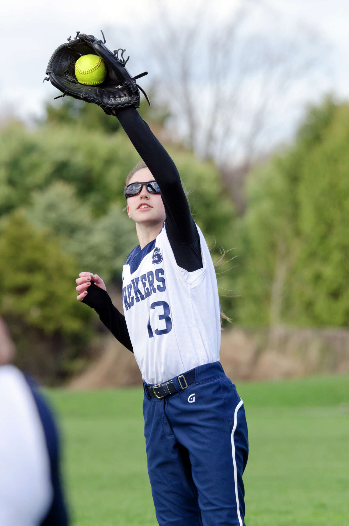 Staples softball edged by Trinity Catholic