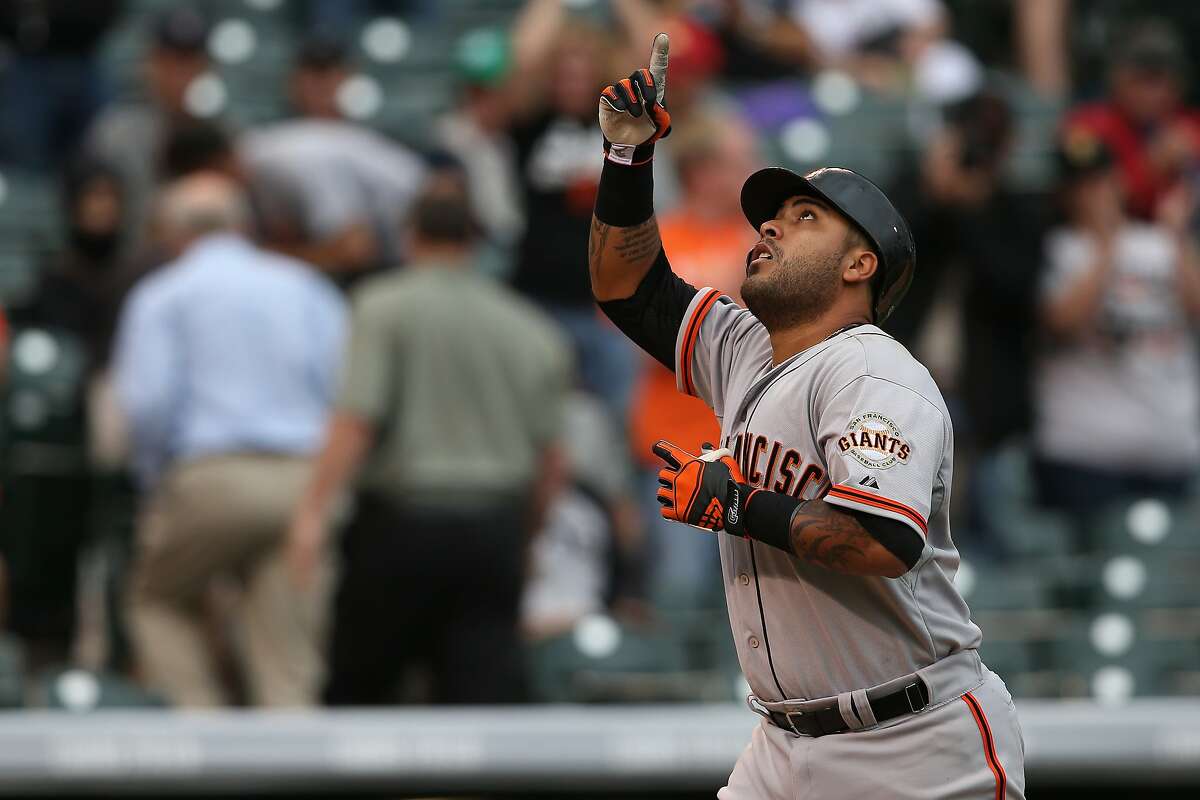 DENVER, CO - APRIL 23: Hector Sanchez #29 of the San Francisco Giants celebrates his game winning grand slam home run off of Chad Bettis #35 of the Colorado Rockies in the 11th inning at Coors Field on April 23, 2014 in Denver, Colorado. The Giants defeated the Rockies 12-10 in 11 innings. (Photo by Doug Pensinger/Getty Images)