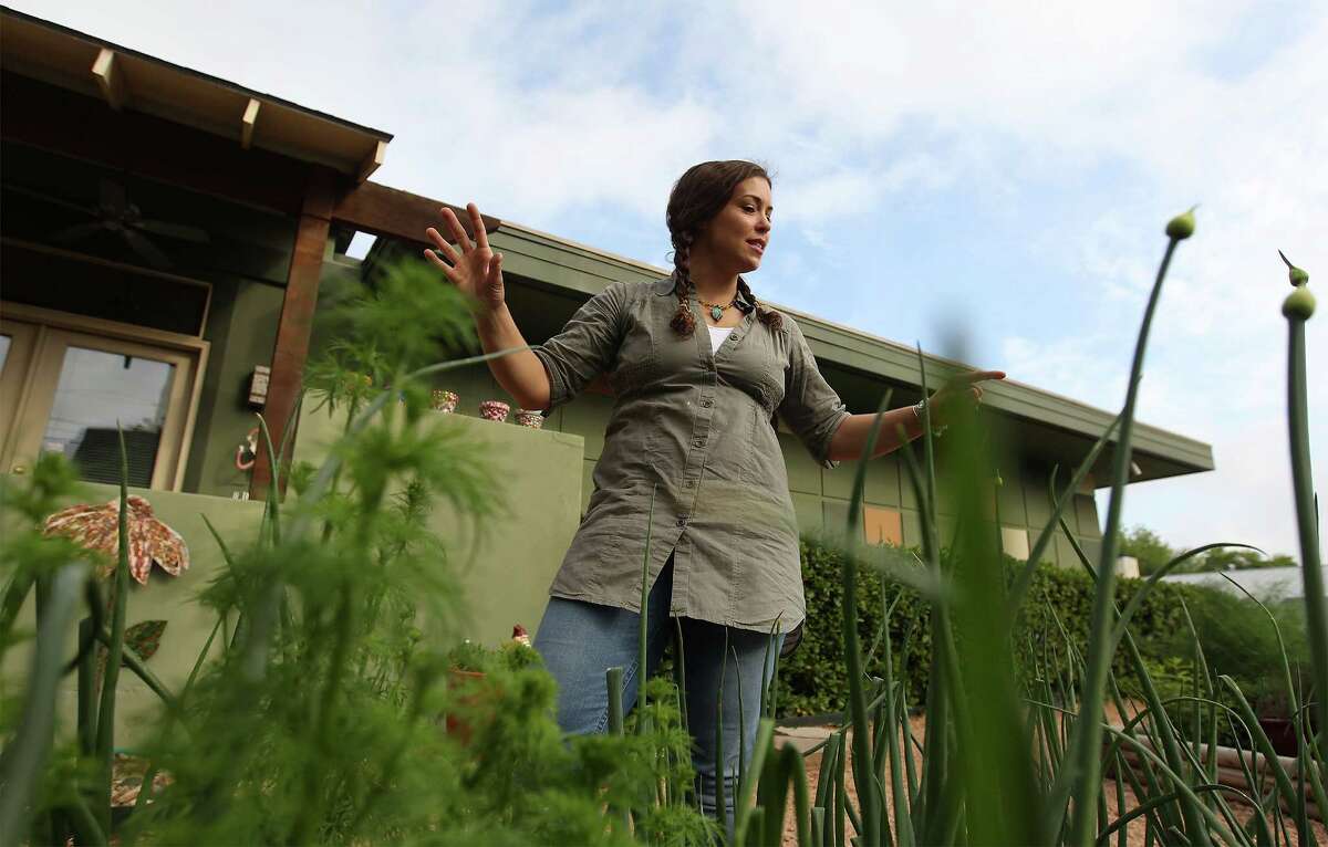 Horticulturalist Heather Ginsberg talks about the Eating Disorder Center at San Antonio (EDCASA) clinic's therapy garden on Thursday, Apr. 10, 2014. EDCASA officials started the garden in 2010 to be a part of a client's therapy. The garden has been proven effective according to the clinic's officials.