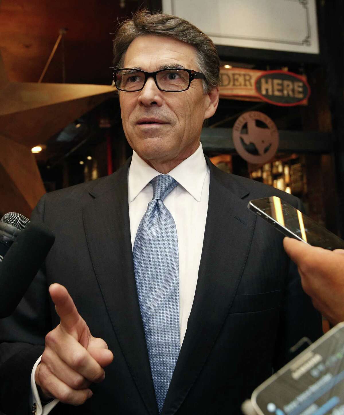 Gov. Rick Perry declined to say what companies he met with in New York.