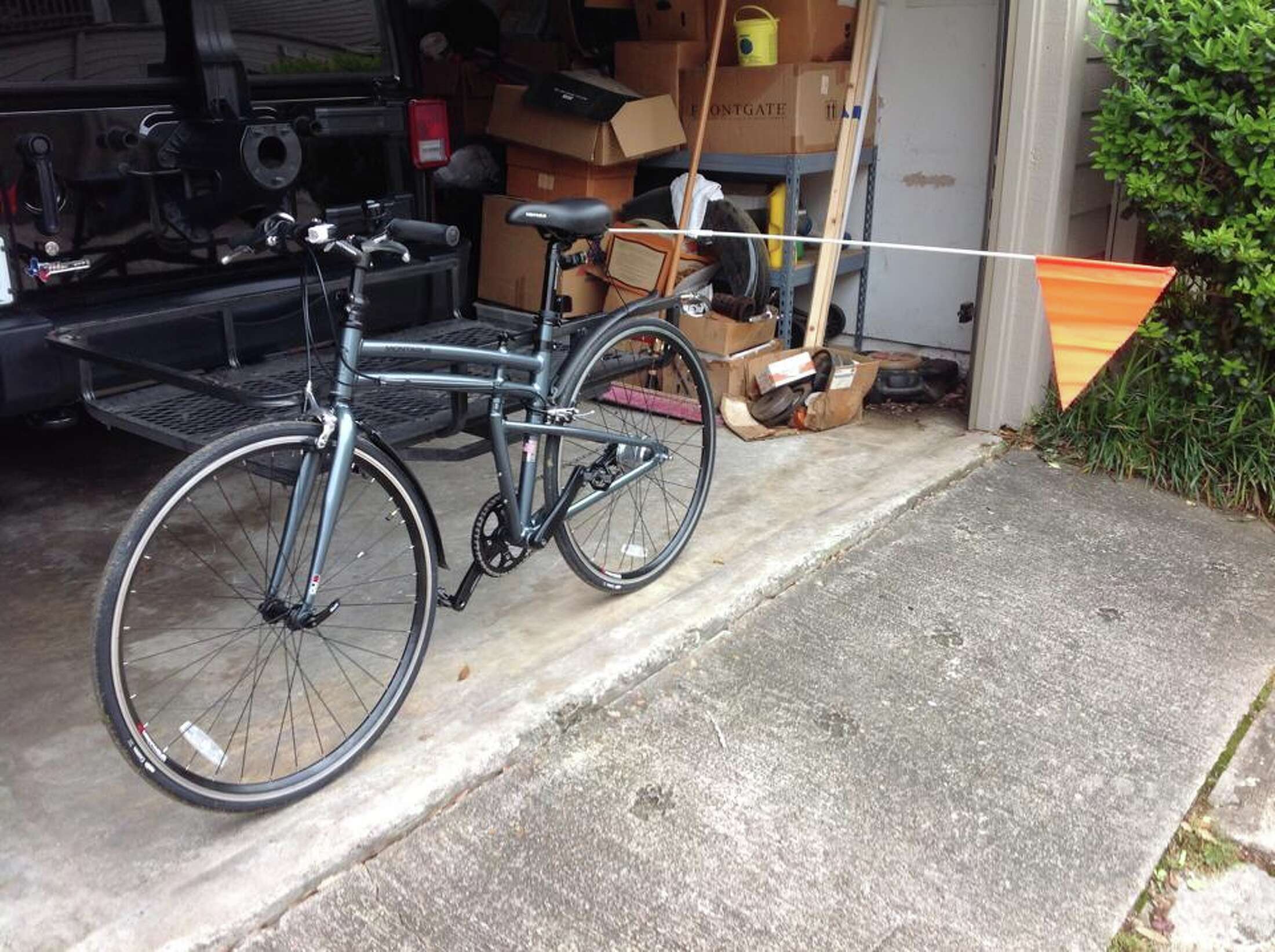 Cyclist uses long pole, video camera to remind Houston drivers to stay away
