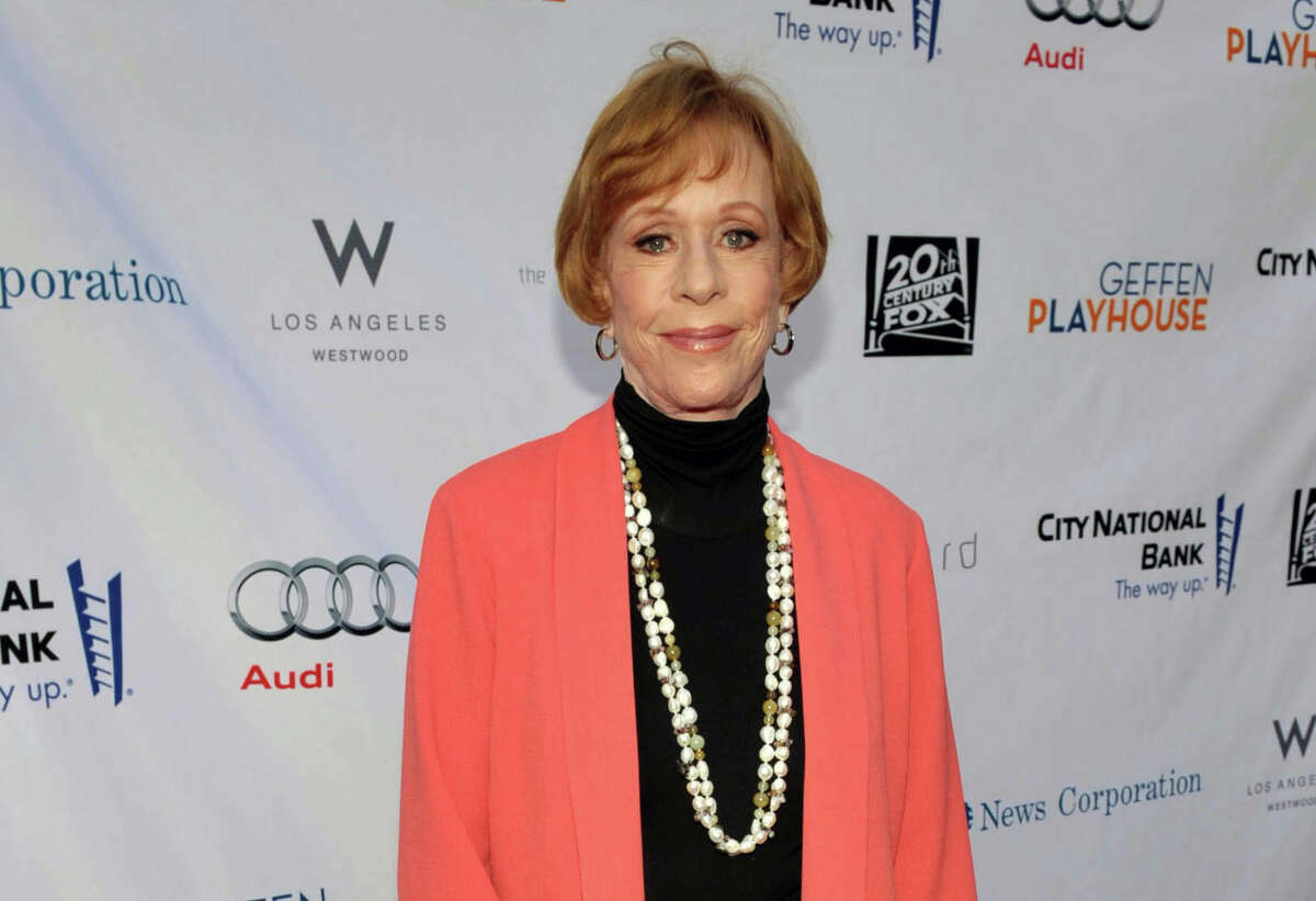 FILE - In this June 4, 2012 publicity image provided by Geffen Playhouse, Carol Burnett arrives at the "Backstage At The Geffen" Fundraiser at the Geffen Playhouse, in Los Angeles. On Jan. 10, 2013, Burnett will be honored with the "Carol Burnett Honor of Distinction Award," presented by The Hollywood High School Performing Arts Center at the El Capitan Theatre in Hollywood, Calif. (AP Photo/Geffen Playhouse, John Shearer, File)