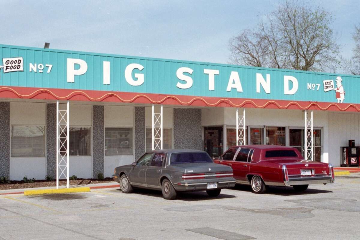 Exterior photo of the Pig Stand Restaurant, once the oldest restaurant in Houston, on Washington Avenue, seen here in 1995.