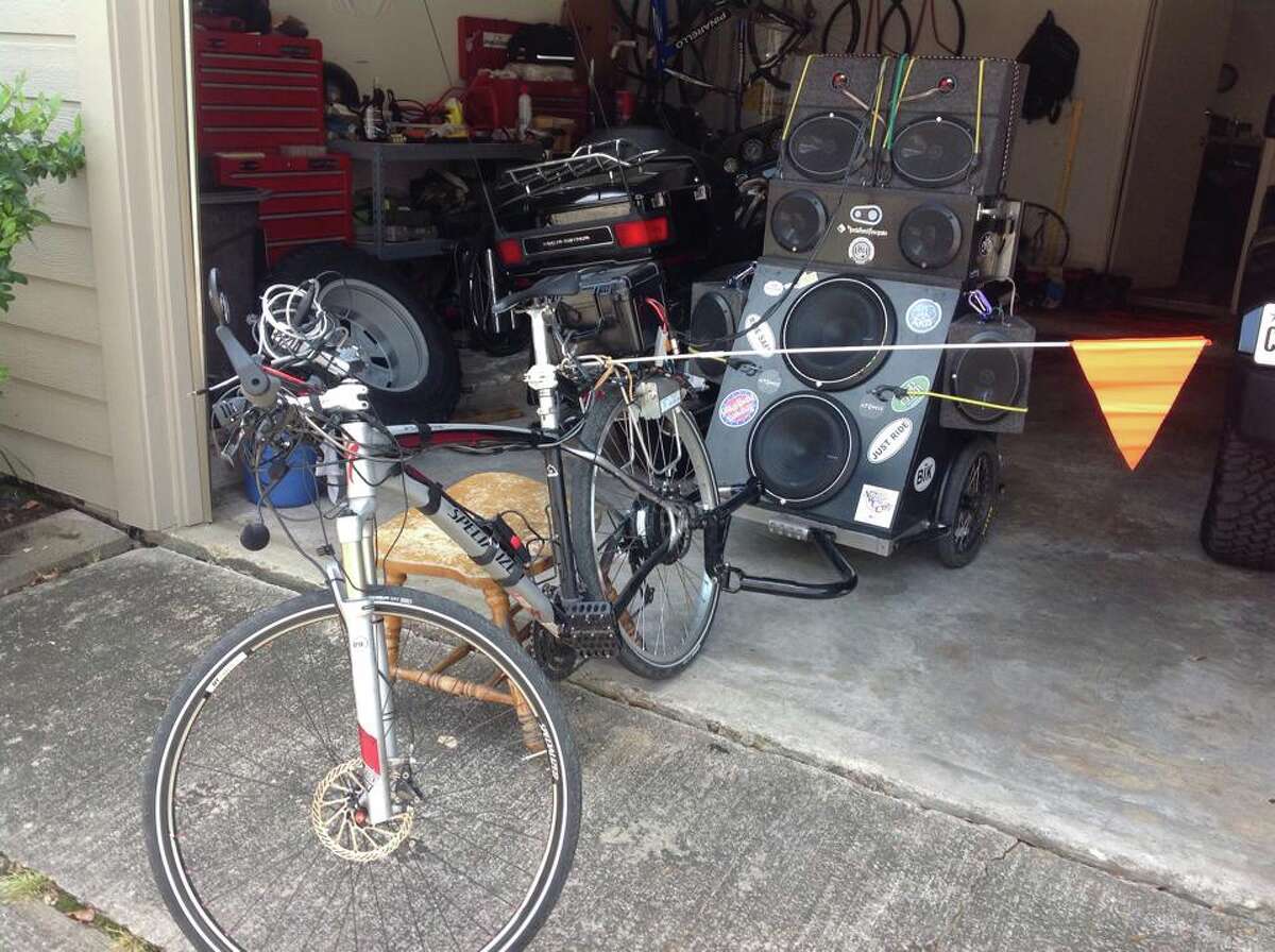 Cyclist uses long pole, video camera to remind Houston drivers to stay away