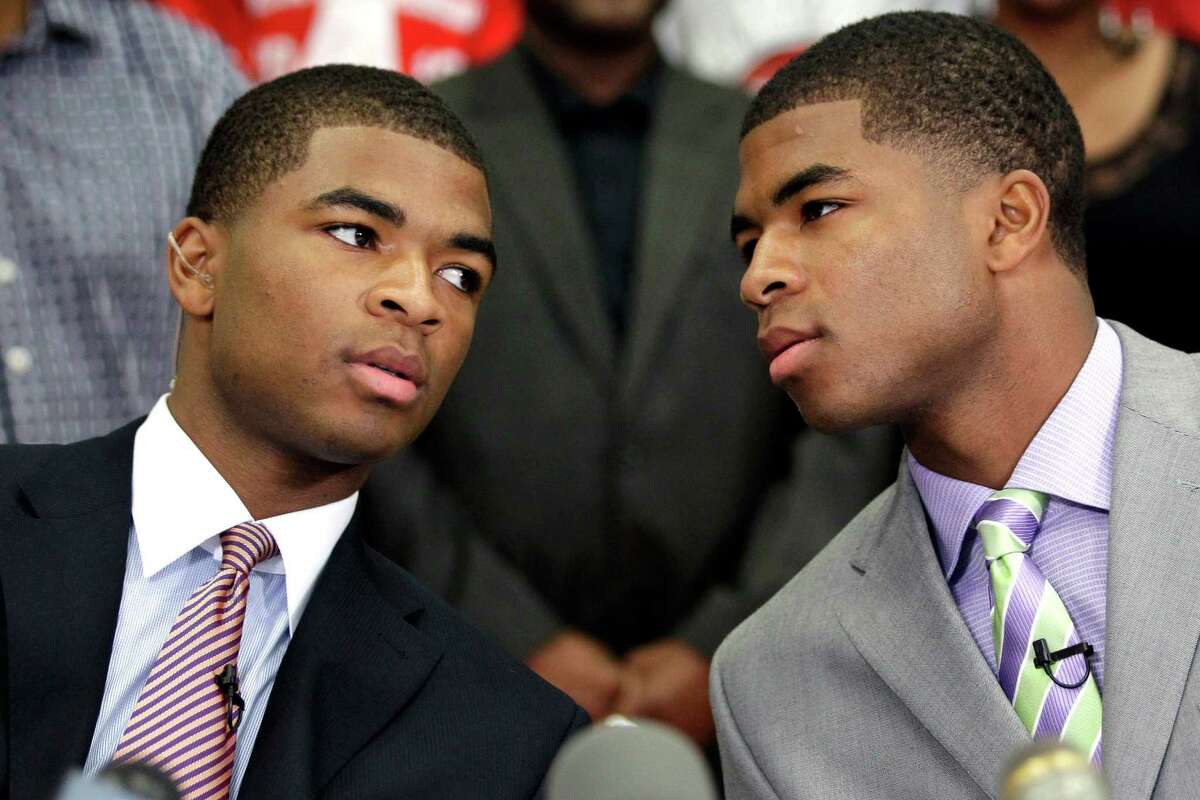 FILE - In this Oct. 4, 2012 file photo, wwins Aaron, left, and Andrew Harrison, right, talk before announcing they will attend and play NCAA college basketball for Kentucky, in Richmond, Texas. The twins will return for a second season to a stocked Wildcats squad coming off an NCAA championship appearance. (AP Photo/David J. Phillip, File) ORG XMIT: NY163