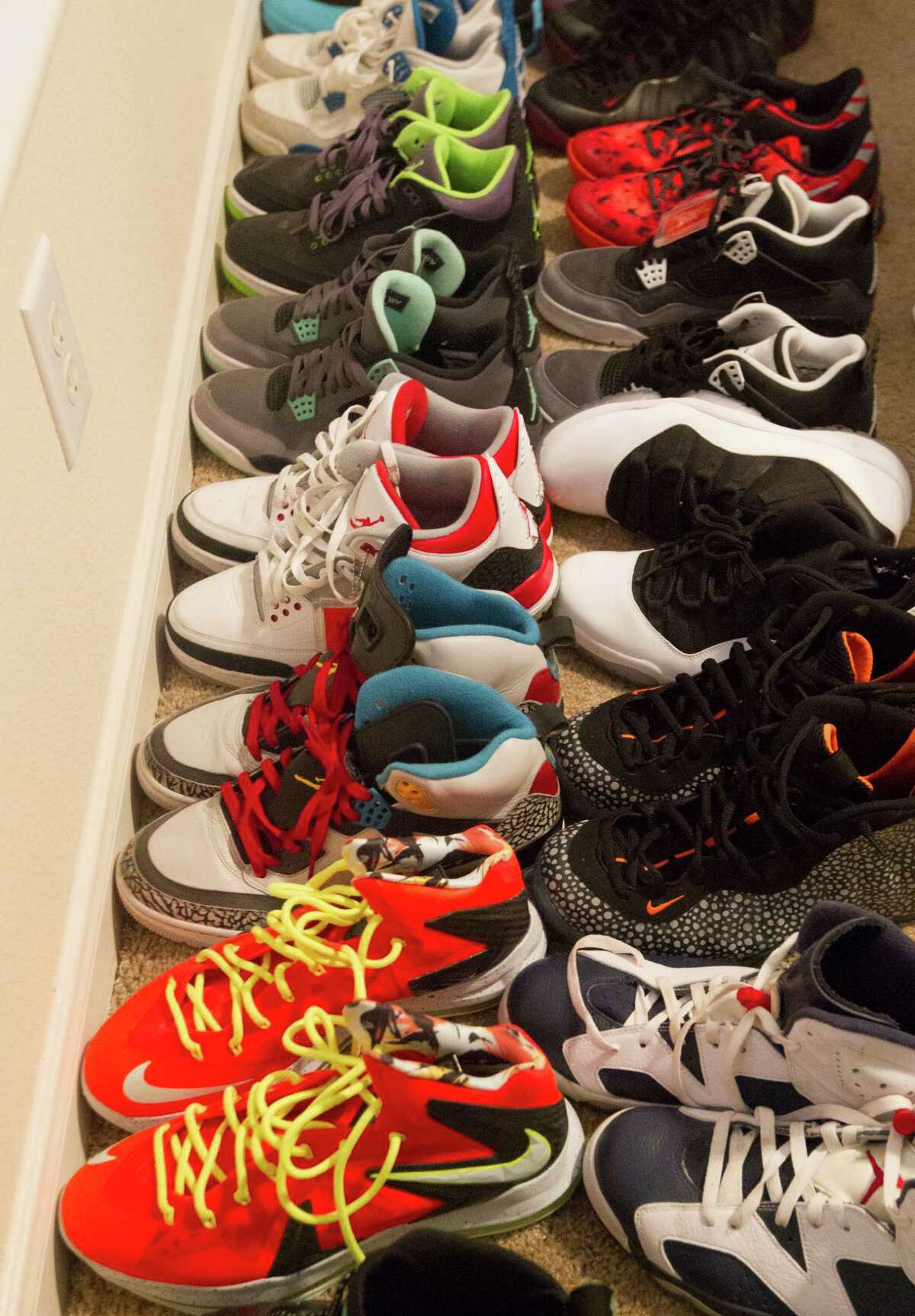 Demetri Goodson's one concession to personal flash is the 200 pairs of high-end basketball shoes he owns.