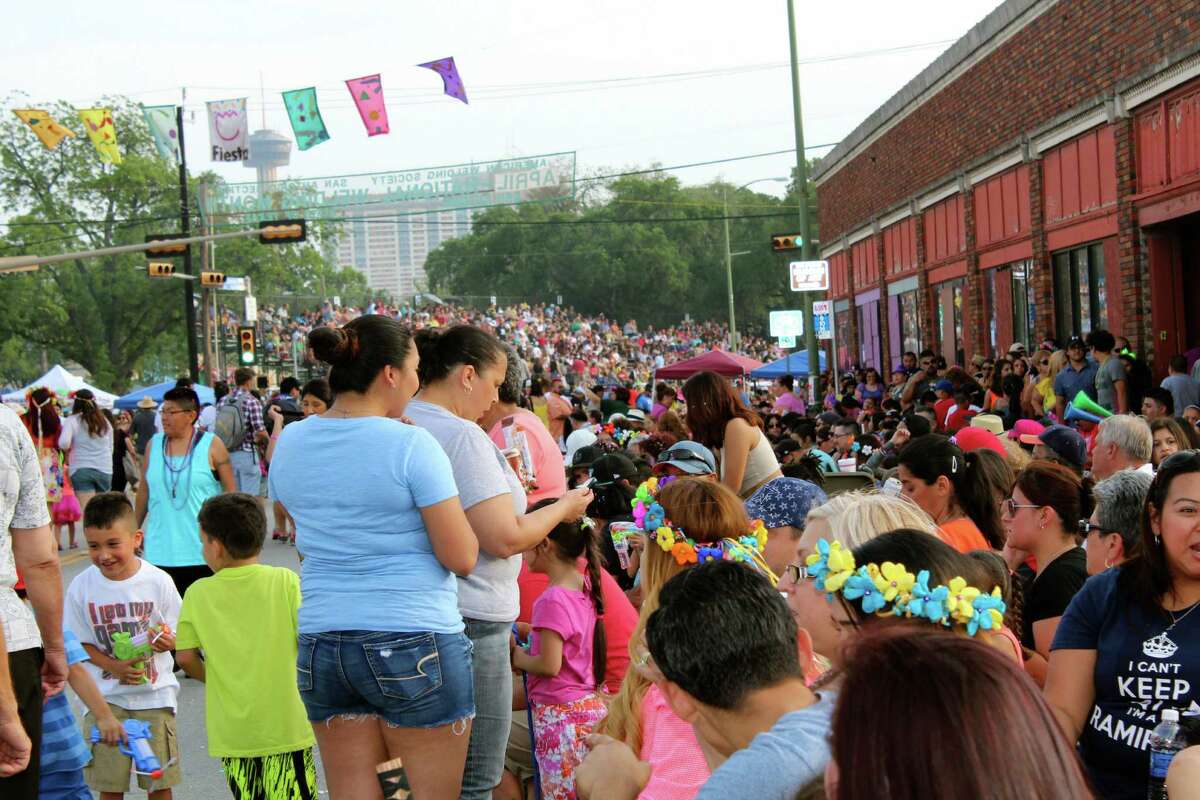 A look a the people who hit the streets for the 2014 Fiesta Flambeau Parade.