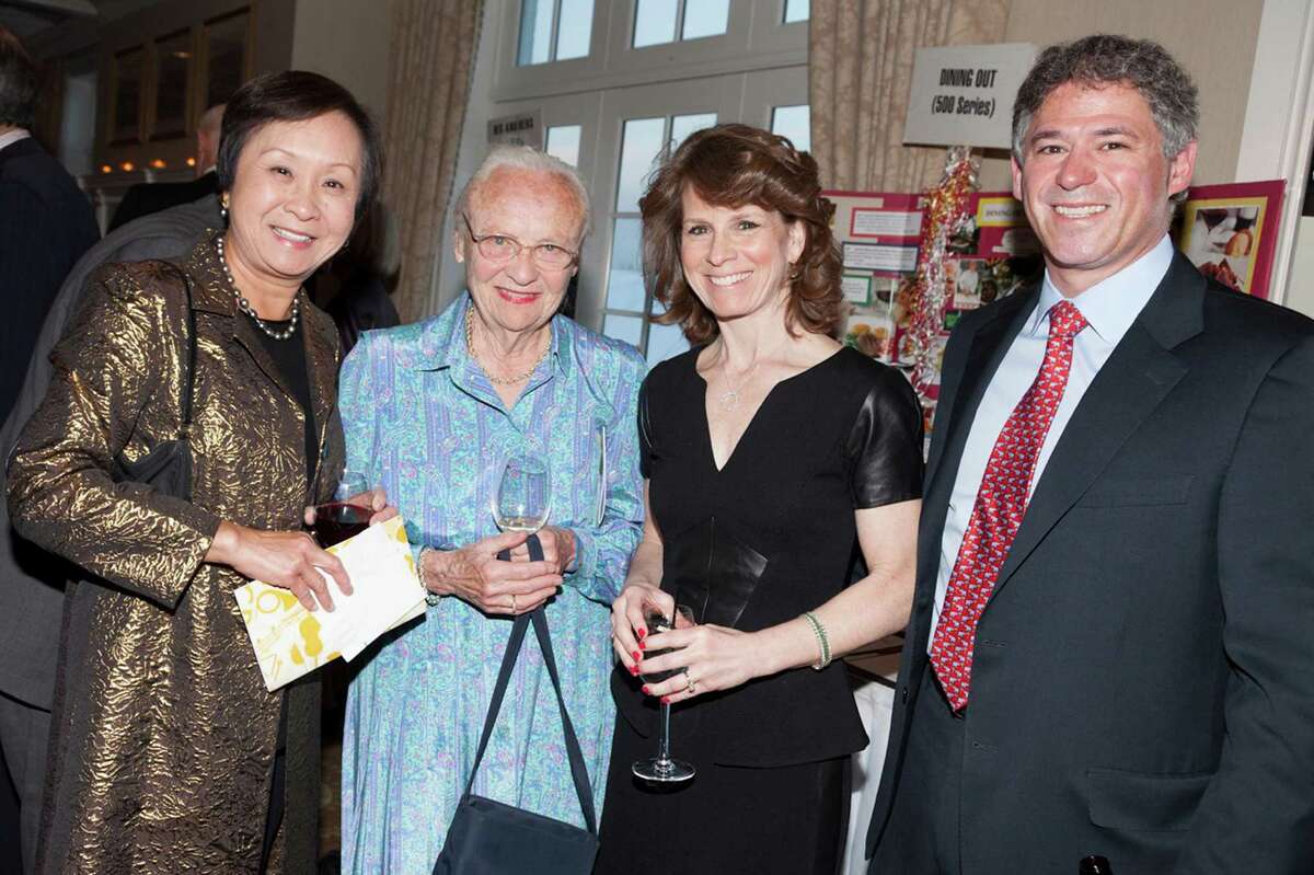 Friends and supporters of the Greenwich Symphony recently enjoyed a festive dinner dance held at the Greenwich Country Club to raise funds for the benefit of the Symphony and its Young Peopleís Concerts program. The event honored Julie Faryniarz for her work as Executive Director of the Greenwich Alliance for Education. Pictured, from left are Hsiao-Lien Boardman; Mary Radcliffe, Board Chair of the Greenwich Symphony; Julie Faryniarz, event honoree; and Danny Faryniarz."