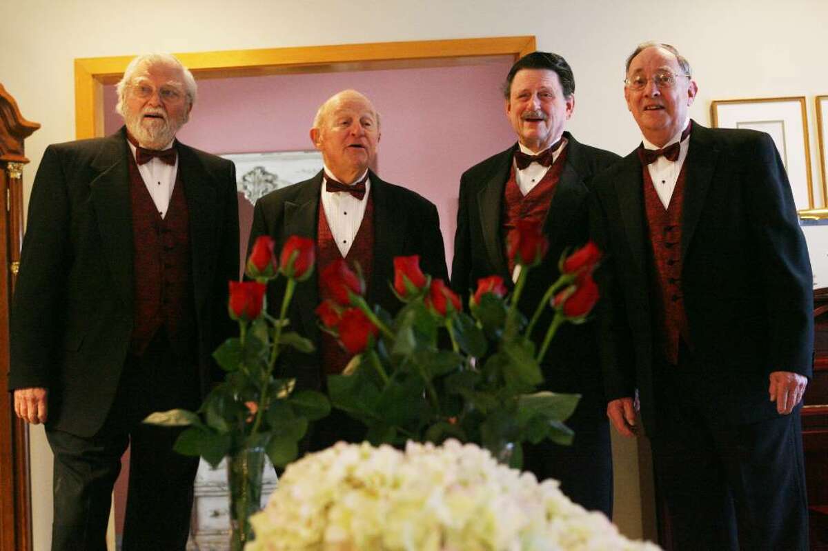 Members of the Senior Moments, from left to right, Dave Brooks, Pete Turner, Rich Allman, and Jim Farrell, deliver a singing valentine in Stratford. The Valentines are delivered by tuxedoed Coastal Chordsman and proceeds benefit charities and educational programs. Valentines can be arranged this weekend by calling (203) 874-6759.