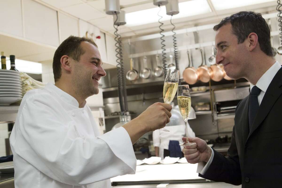 New York's Eleven Madison Park has been named the world's best restaurant. Here, EMP owners Daniel Humm (former chef of Campton Place) and Will Guidara toast during a San Francisco visit several years ago.