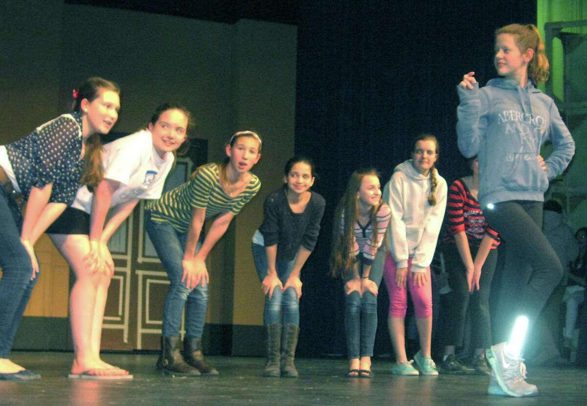 Among those in rehearsal for Shepaug Valley Middle School's April 10, 2014 performance of "Hairspray Jr." are Julia Billings of Bridgewater and, from left to right, Lily Schur of Bridgewater, Kiera Koval of New Preston, Grace Harty of Roxbury, Bailey Pote of New Preston, Elaina daFonte of Roxbury, Ashley Mulhare of Roxbury and, partially hidden, Emily Ward of Washington. Courtesy of Cheryl Crossley