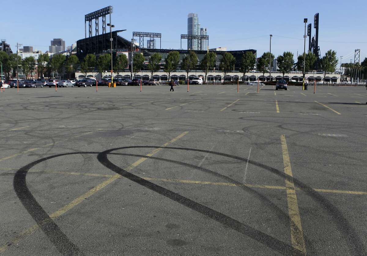 Skid marks are left in parking Lot A, across from AT&T Park in San Francisco, Calif. on Tuesday, April 29, 2014. The Giants are proposing to build a large mixed-use community on the site, but the plans may be derailed if Prop. B, which would impose height limits on waterfront developments, is passed by voters.