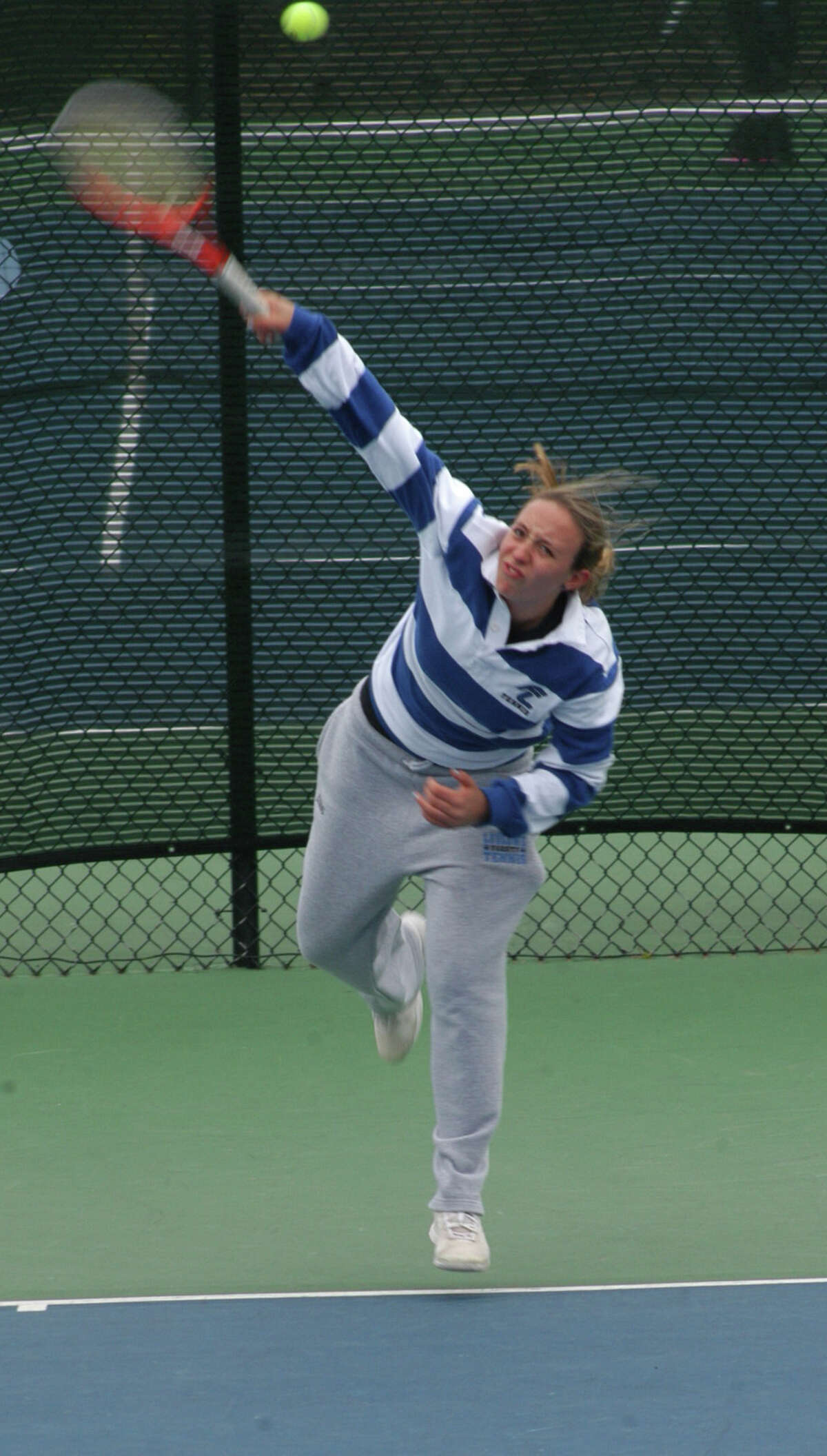 Fairfield Ludlowe junior Lindsey Evan returning a shot at first singles on Tuesday, April 29 in an FCIAC girls tennis match on the Falcons' courts. Ludlowe beat Warde 5-2. Evans won her match over Emily Simonds in straight sets 6-0, 6-0.