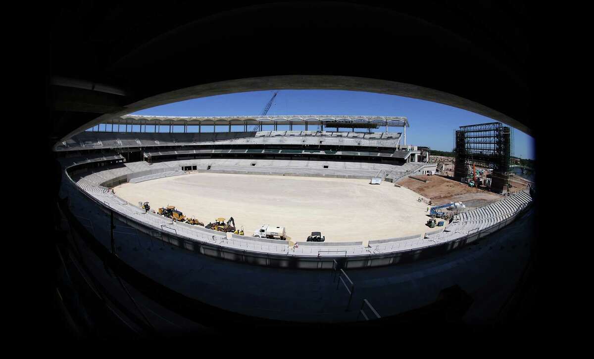The new Baylor McLane $260 million on-campus stadium is seen through a wide-angle lens. The stadium is located on a 93-acre site at the intersection of Interstate 35 and the Brazos River. Officials gave a tour of the stadium, Wednesday, April 30, 2014, in Waco, Texas. (AP Photo/Waco Tribune Herald, Rod Aydelotte)