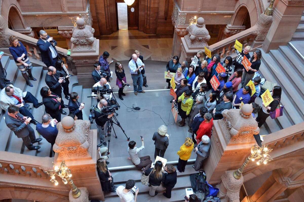 A group of prominent women leaders rallied Million Dollar Staircase to demand support for legislation allowing cities and counties to raise wages above the state's minimum wage Wednesday April 30, 2014, at the Capitol in Albany, N.Y. (John Carl D'Annibale / Times Union)