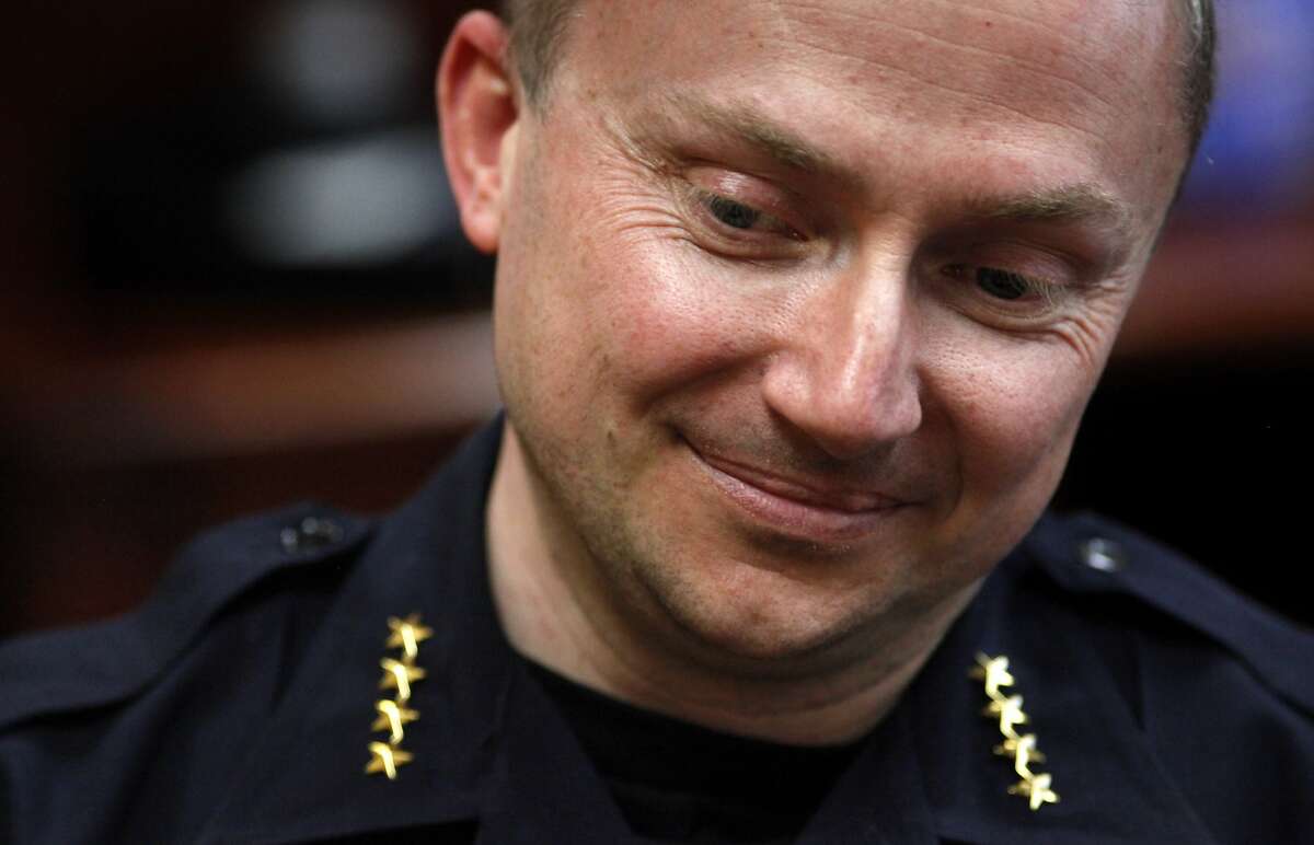 Oakland's new Police Chief Sean Whent smiles as he talks with reporters about taking over the department, Monday May 13, 2013 on Telegraph Ave in Oakland, Calif.