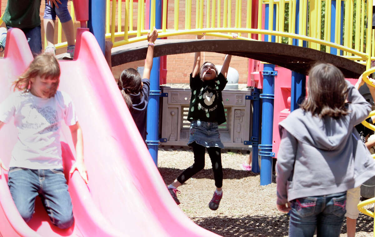 Students at play during recess at Oak Forrest elementary Wednesday April 30, 2014. (Billy Smith II / Houston Chronicle)