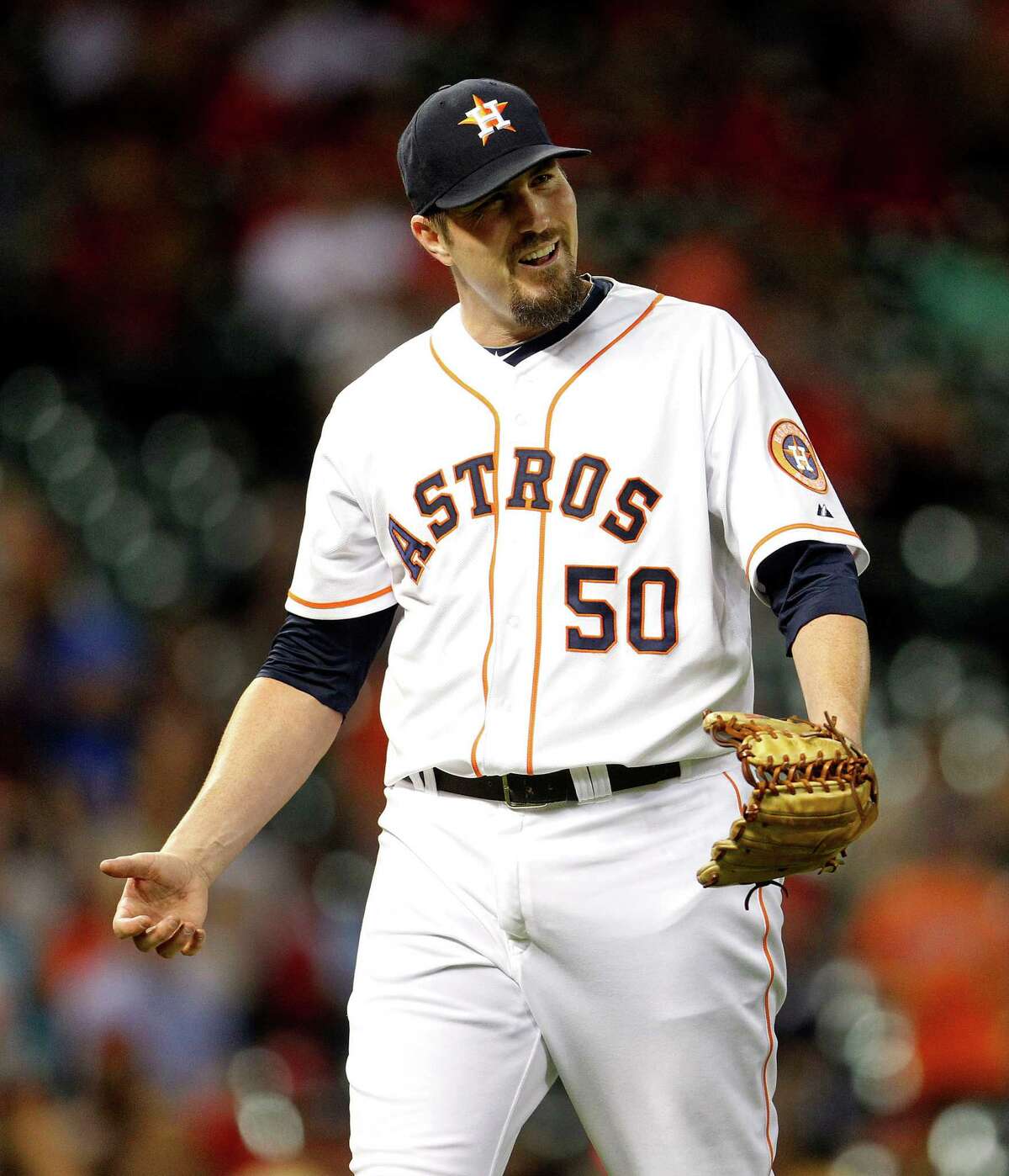 Veteran reliever Chad Qualls is pulling double duty as pitcher and mentor as the Astros' bullpen struggles this season.