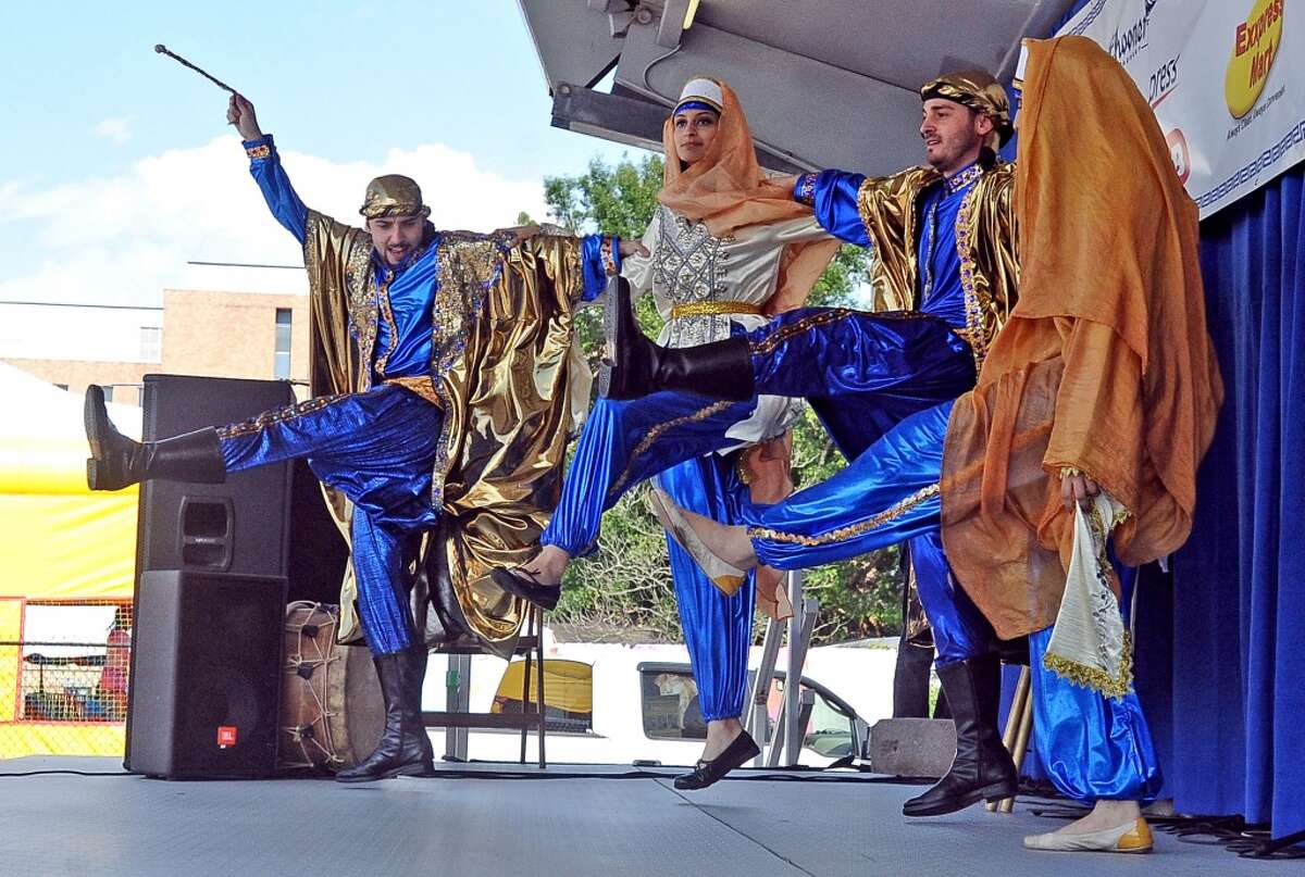 The Al Awtar Zaffa Group participates in folk dancing at the St. Michael Orthodox Christian Church Mediterranean Festival on Saturday, May 11, 2013. Photo taken: Randy Edwards/The Enterprise