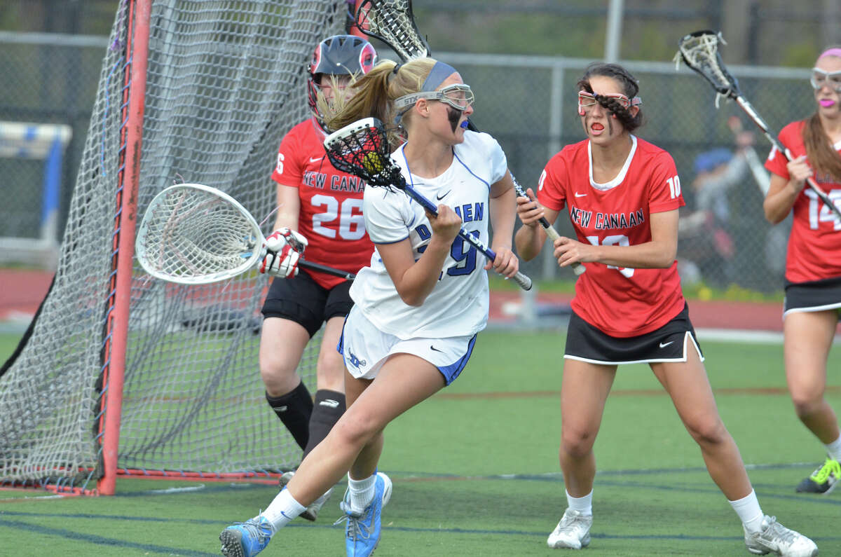 Darien girls lacrosse dispatches of New Canaan with big second half