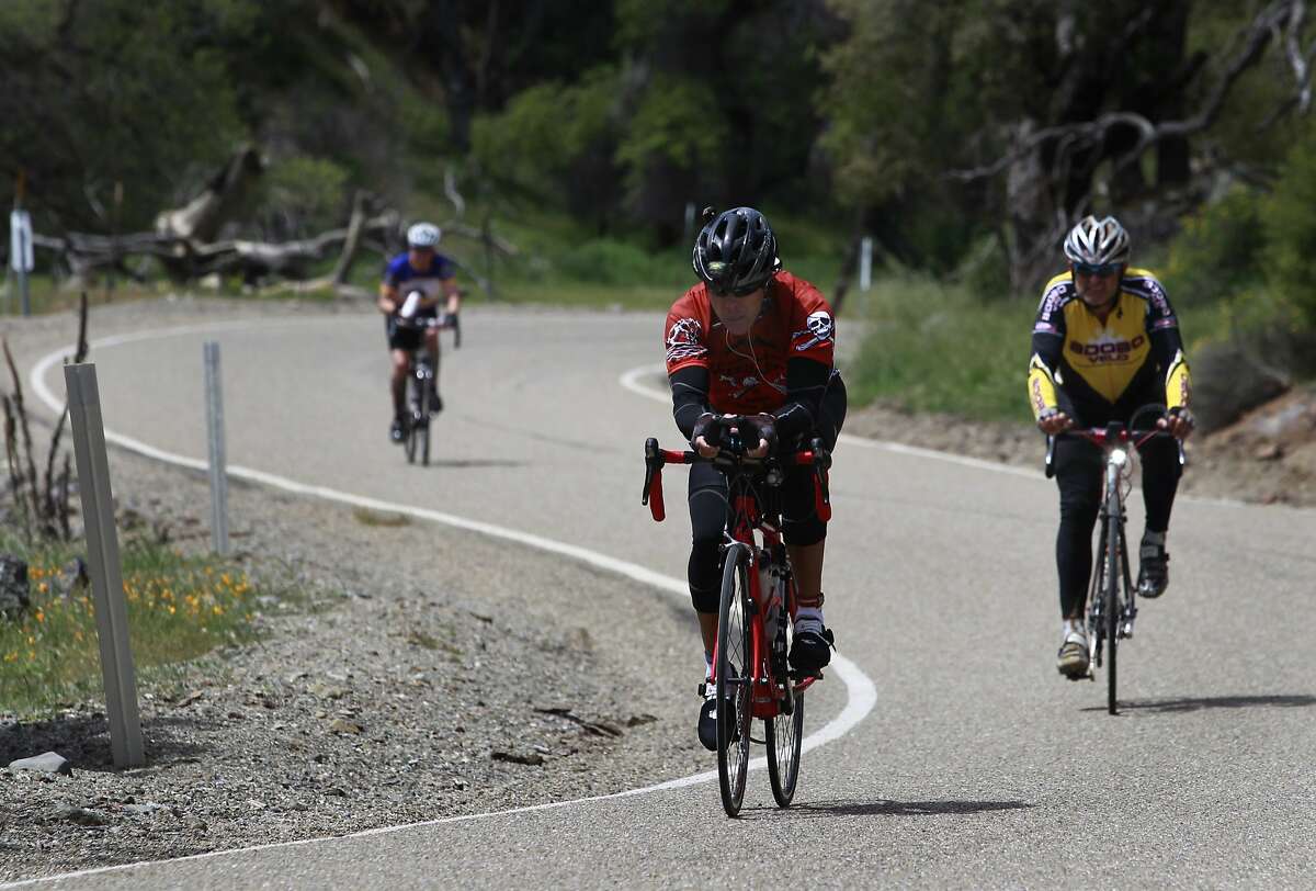 Bicyclists climb a curvy section of Mines Road near the halfway point of the Devil Mountain Double Century ride in Livermore, Calif. on Saturday, April 26, 2014. The 206-mile route includes climbs to the peaks of both Mount Diablo and Mount Hamilton.