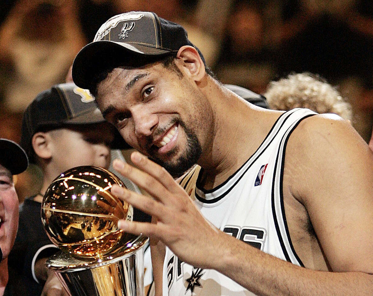 Tim Duncan celebrates as he was named the MVP of the NBA Finals for a third time when the Spurs won the NBA title in 2005 against the Pistons.