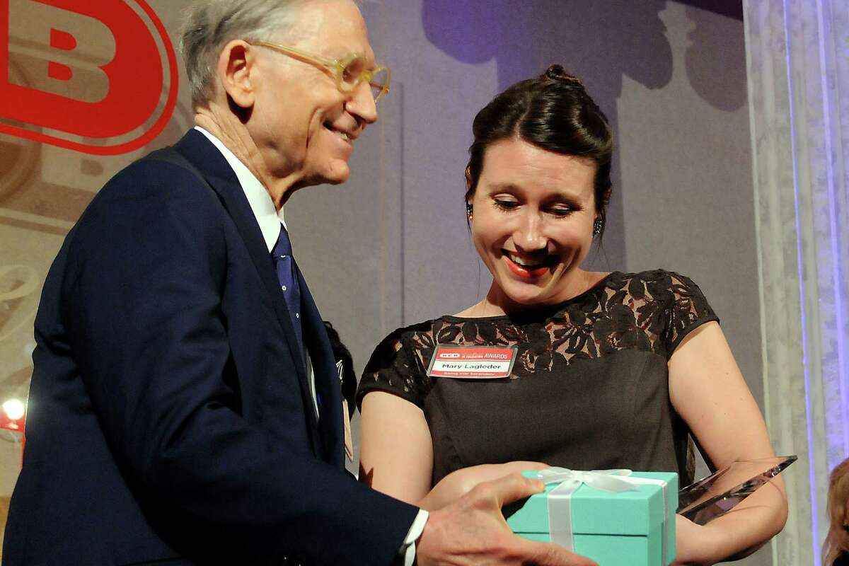 Mary Lagleder from Earl Warren High School is awarded the Rising Star award by Charles Butt at the HEB Excellence in Education Awards dinner at the Royal Sonesta Hotel Saturday May 03, 2014. Winners received $5000 and $5000 for their school.(Dave Rossman photo)