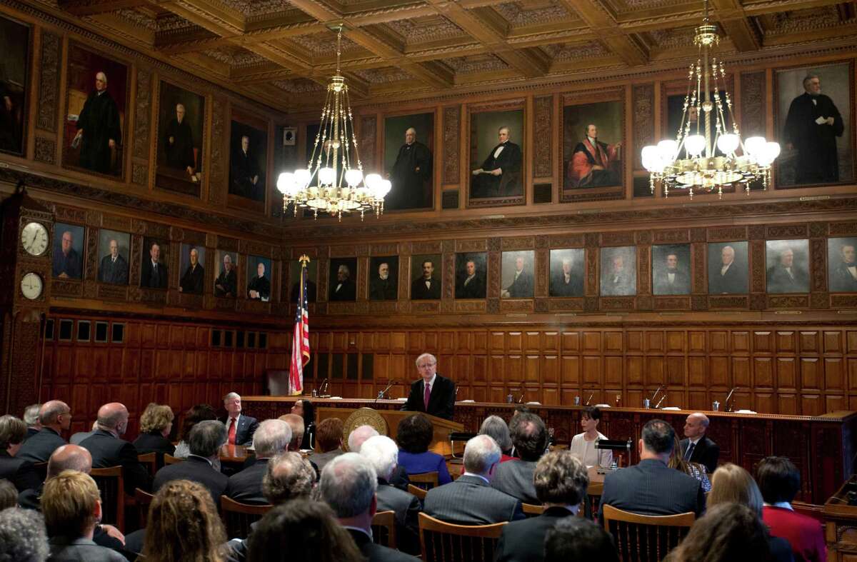 Chief Judge Jonathan Lippman speaks during a Law Day event at the Court of Appeals on Wednesday, April 30, 2014, in Albany, N.Y. Lippman has proposed reforming consumer debt cases in state courts with new filing requirements for collectors of so-called "zombie" debts. (AP Photo) ORG XMIT: NYMG108