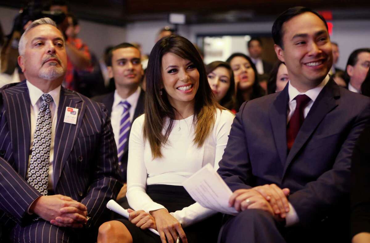 Actress Eva Longoria, center, Henry R. Munoz III, co-founder of the Latino Victory Project, left, and Rep. Joaquin Castro, D-Texas, are seated at an event launching The Latino Victory Project, a Latino political action committee, at the National Press Club in Washington, Monday, May 5, 2014. (AP Photo/Charles Dharapak)