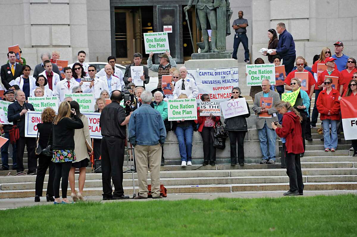 People participate in a rally in support of the New York Health bill, which creates a universal, single-payer health insurance program outside the Capitol on Tuesday May 6, 2014 in Albany, N.Y. (Lori Van Buren / Times Union)