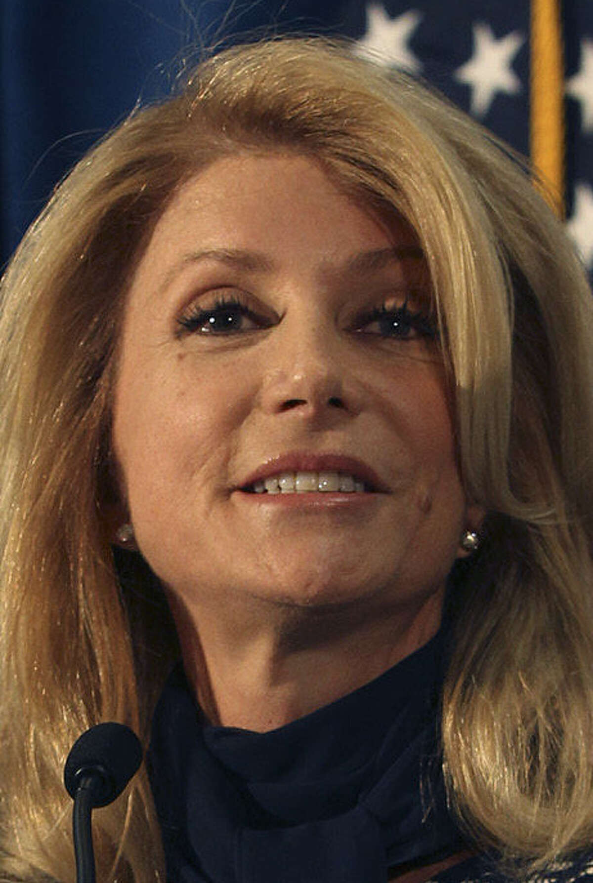 Democrat Wendy Davis accused her foe of abandoning his watchdog role at CPRIT in a way that betrayed Texans and aided donors.