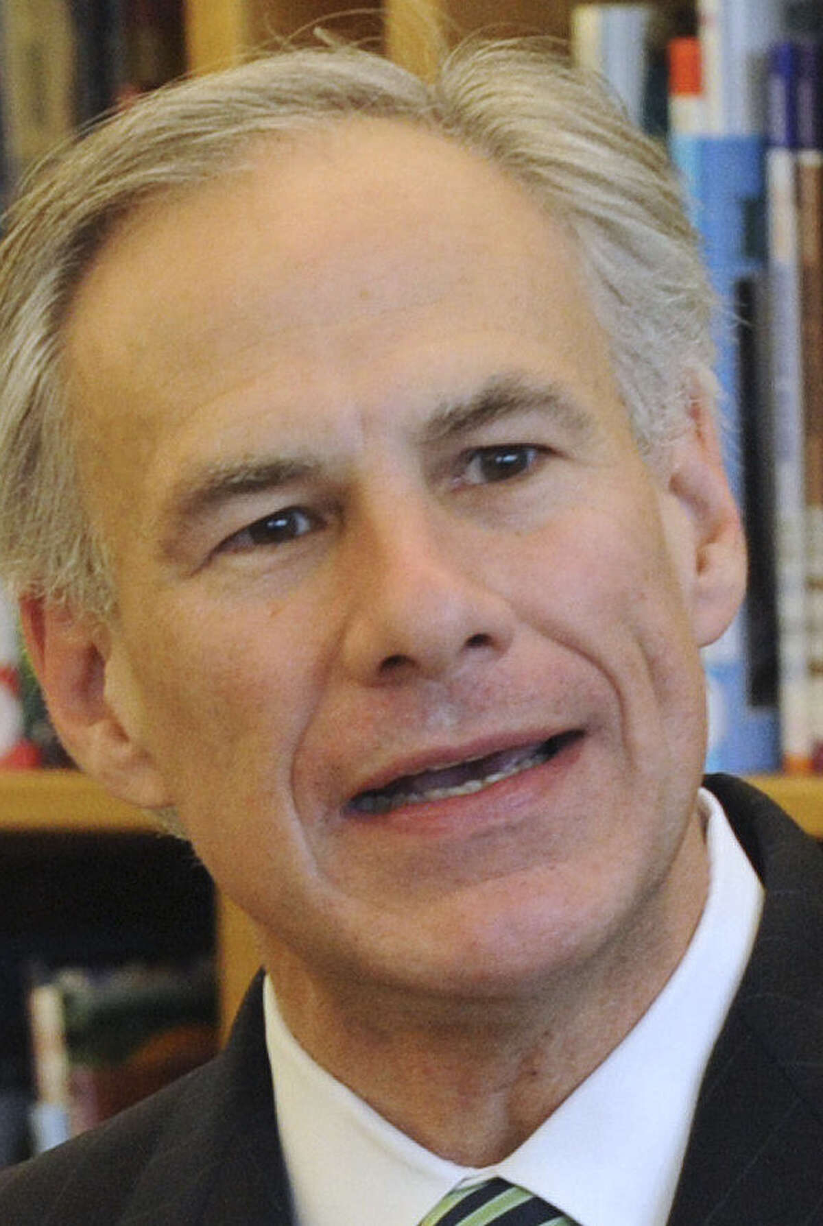 Republican Greg Abbott's campaign defended his role with regard to the Cancer Prevention and Research Institute, citing help for a probe.