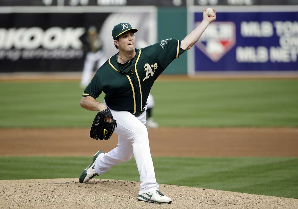 Oakland Athletics starting pitcher Drew Pomeranz throws to the Seattle Mariners during the first inning of a baseball game on Wednesday, May 7, 2014, in Oakland, Calif. (AP Photo/Marcio Jose Sanchez)