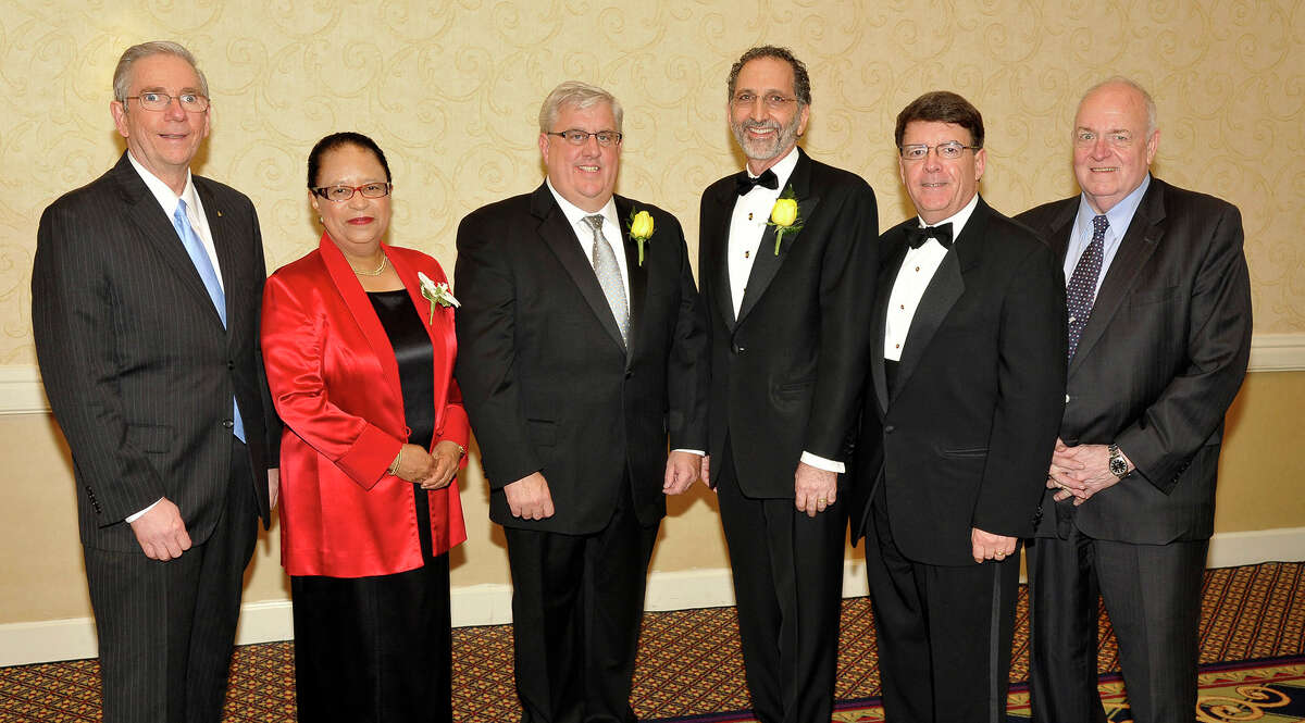Three business leaders were inducted Wednesday evening into the Tech Valley Hall of Fame during the annual Hall of Fame Dinner and Induction Ceremony at the Albany Marriott Hotel in Colonie. Inductees were Shirley Ann Jackson, the 18th president of Rensselaer Polytechnic Institute in Troy; I. Norman Massry, principal of Massry Realty Partners; and, pothumously, Michael F. Bette, a founder of Barry & Bette Inc. and Barry, Bette and Led Duke (BBL Construction) and chairman of Bette Companies. From left above are: Ed Murray, President of Junior Achievement of Northeastern New York, Inc., Dr, Jackson, Matthew Bette (son of Michael Bette), I. Norman Massry, President and CEO of the Center for Economic Growth F. Michael Tucker and Director of Corporate Commnications at St. Peter's Health Partners Elmer Streeter. The Tech Valley Business Hall of Fame, a joint effort of Junior Achievement of Northeastern New York and the Albany-based Center for Economic Growth, honors local champions of free enterprise for their dedication to, and success in, making the Tech Valley region a better place to live and work. Wednesday's inductees bring to 56 the number of community leaders who are now members of the Hall of Fame. Their portraits are displayed at the Albany International Airport. (Photo by Gary Gold)