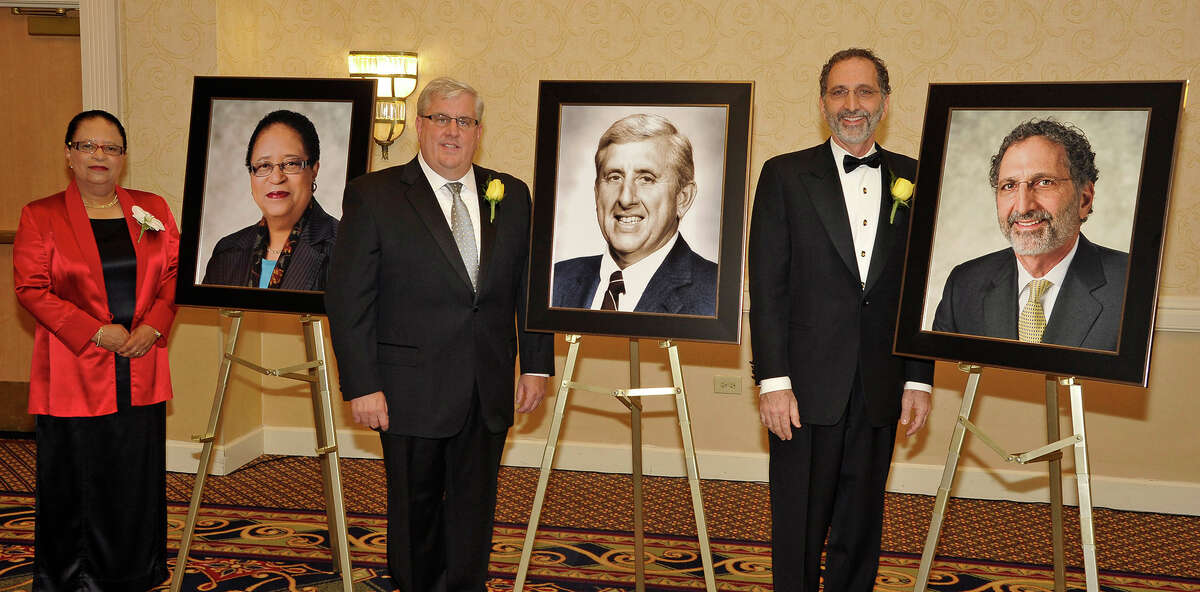 Three business leaders were inducted Wednesday evening into the Tech Valley Hall of Fame during the annual Hall of Fame Dinner and Induction Ceremony at the Albany Marriott Hotel in Colonie. Inductees were Shirley Ann Jackson, the 18th president of Rensselaer Polytechnic Institute in Troy; Matthew Bette accepting for his late father, Michael F. Bette, a founder of Barry & Bette Inc. and Barry, Bette and Led Duke (BBL Construction) and chairman of Bette Companies and I. Norman Massry, principal of Massry Realty Partners. The portraits will be displayed at the Albany International Airport.The Tech Valley Business Hall of Fame, a joint effort of Junior Achievement of Northeastern New York and the Albany-based Center for Economic Growth, honors local champions of free enterprise for their dedication to, and success in, making the Tech Valley region a better place to live and work. Wednesday's inductees bring to 56 the number of community leaders who are now members of the Hall of Fame. (Photo by Gary Gold)
