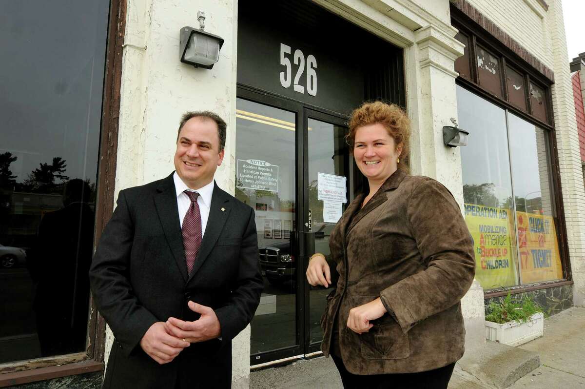 Commissioner Michael Yevoli, left, and Deputy Commissioner Megan Daly, both of the Department of Development and Planning, talk about the former police station that's up for sale on Wednesday, Oct. 12, 2011, in Albany, N.Y. (Cindy Schultz / Times Union)