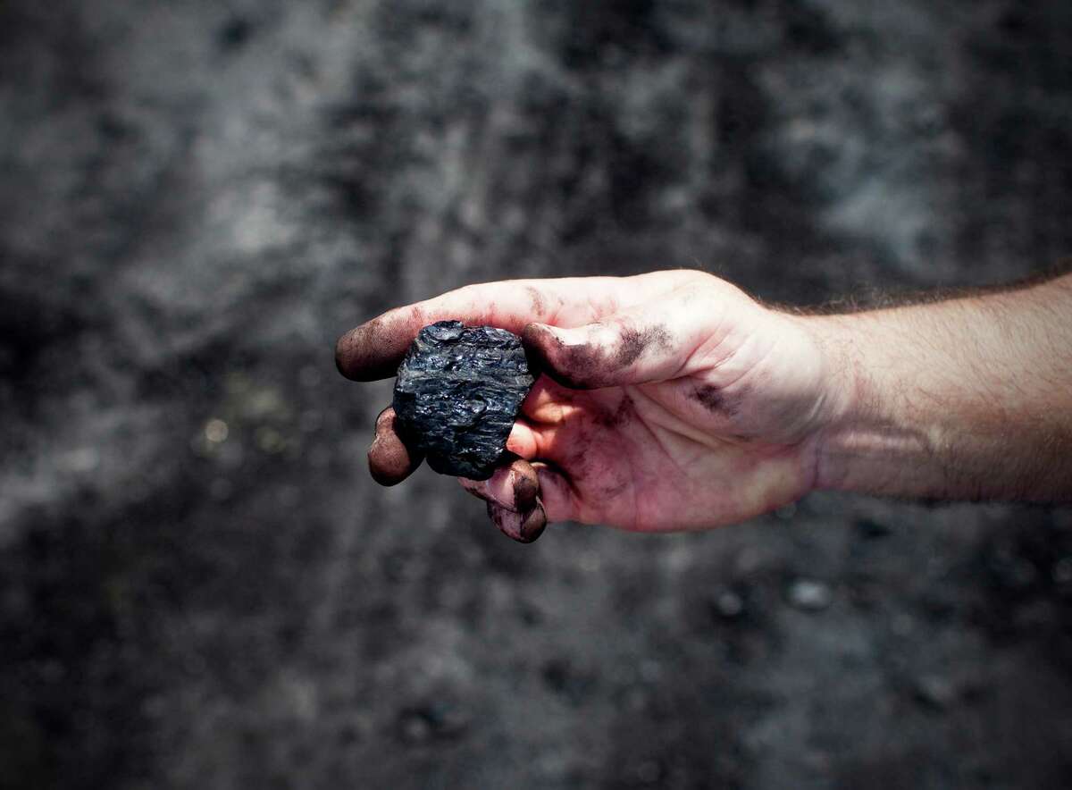 Coal from an open-pit strip mine run by Western Kentucky Minerals near Owensboro, Ky., Aug. 1, 2012. A strip mine proposed by the company could soon abut Camp Pennyroyal, a Girl Scout camp, altering its vista for at least a decade. (Ben Sklar/The New York Times)