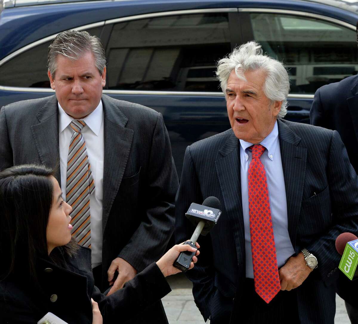 Former state Senate Majority Leader Joseph L. Bruno, enters the James T. Foley U.S. Courthouse under the watchful eye of his son and attorney Ken Bruno, left, on Thursday May 8, 2014 in Albany, N.Y. (Skip Dickstein / Times Union) ORG XMIT: J=0509_bruno