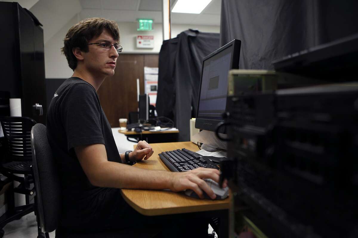 Astronomy graduate student Alex Rudy works on a computer in the Adaptive Optics Lab on the UC Santa Cruz campus in Santa Cruz, CA, Friday May 9, 2014.