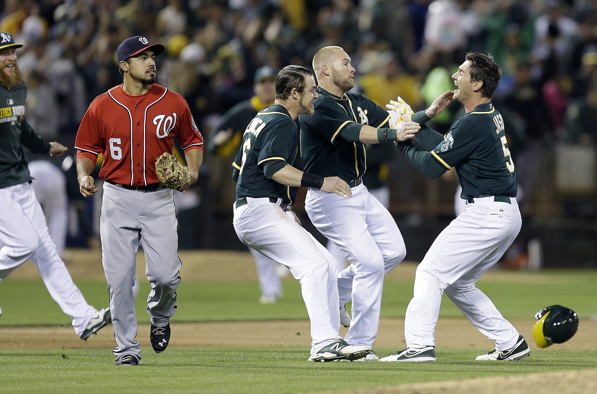 Big hits by Jaso help A's rally past Nationals 4-3