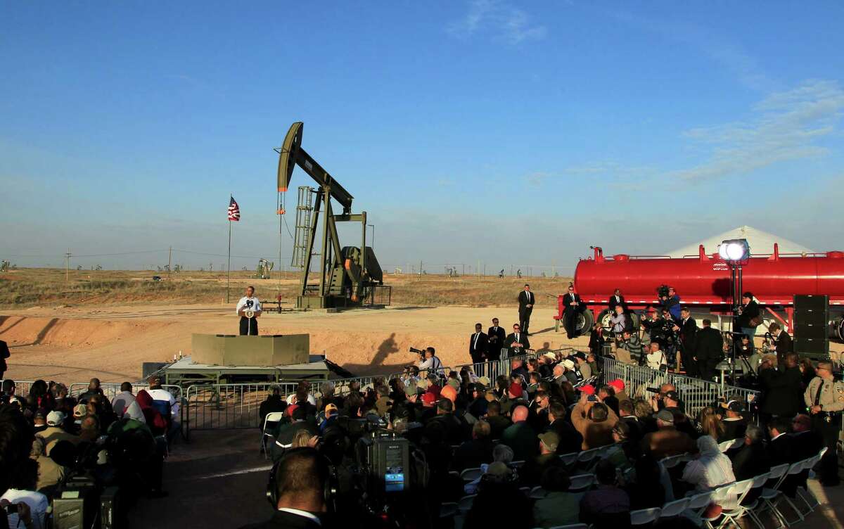 FILE - In this March 21, 2012, file photo, with oil pump jacks as a backdrop, President Barack Obama speaks at an oil and gas field on federal lands in Maljamar, N.M. The government has failed to inspect thousands of oil and gas wells it considers potentially high risks for water contamination and other environmental damage, congressional investigators say. The report, obtained by The Associated Press before its public release, highlights substantial gaps in oversight by the agency that manages oil and gas development on federal and Indian lands. (AP Photo/Ross D. Franklin, File) ORG XMIT: WX303