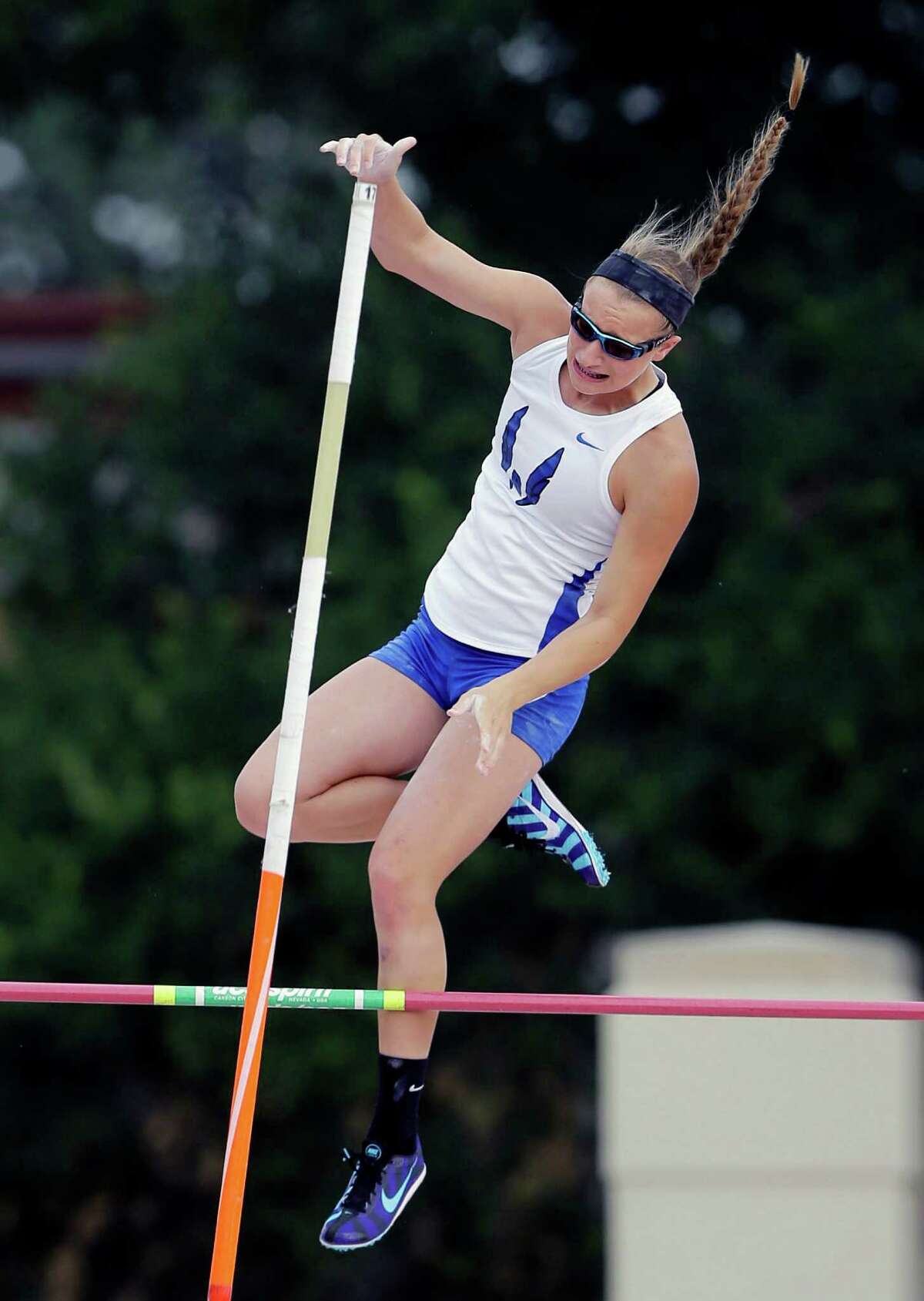 Legally blind pole vaulter soars as role model at state meet