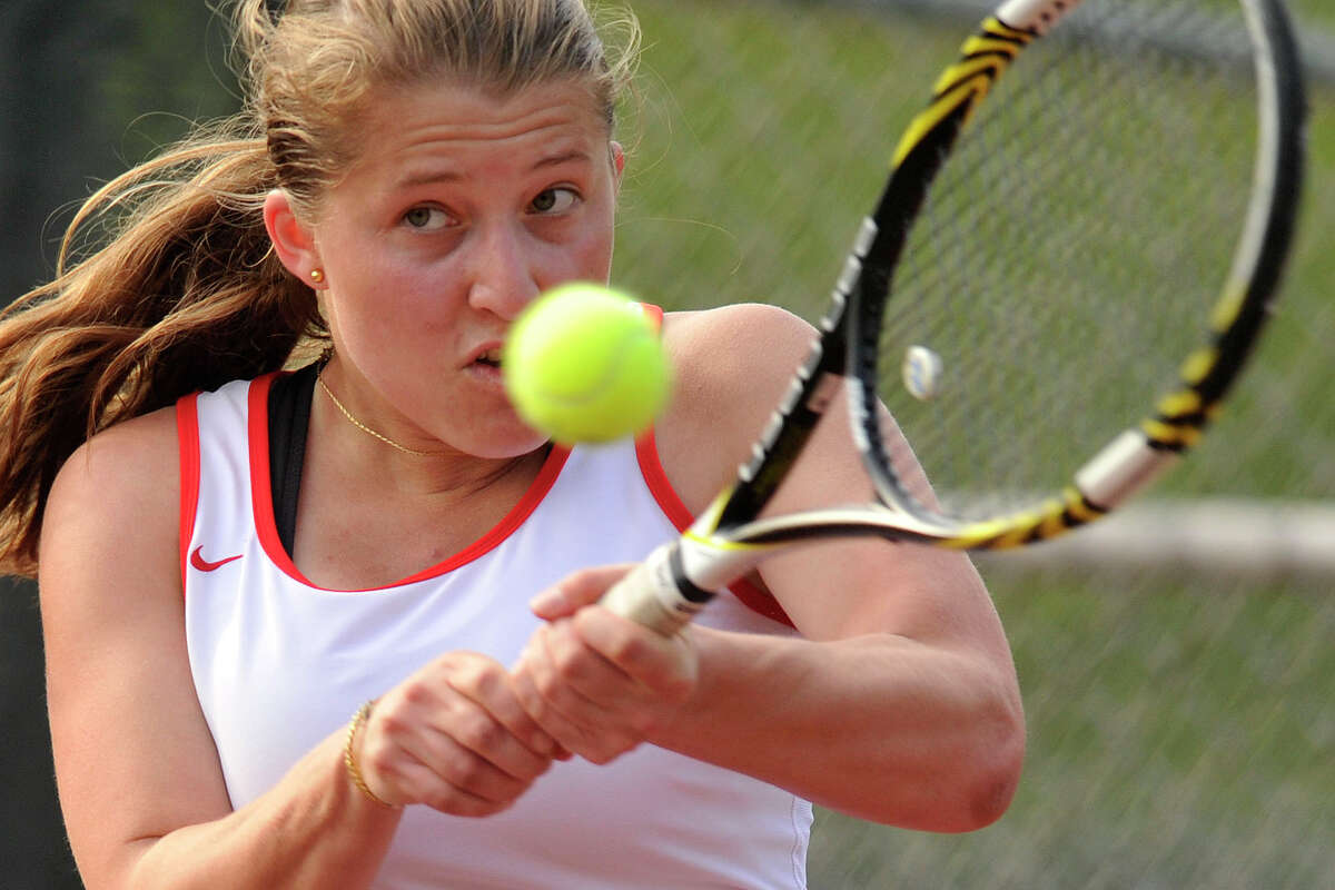 Greenwich's Anna Daccache returns the ball to Fairfield Ludlowe's Lindsey Evans during their tennis match at Greenwich High School in Greenwich, Conn., on Monday, May 12, 2014.