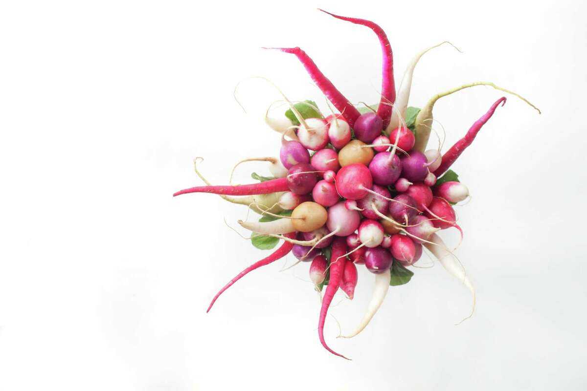 Bouquet or basket of beautiful radishes as seen in San Francisco, California on Wednesday April 2, 2014. Styled by Jillian Welsh