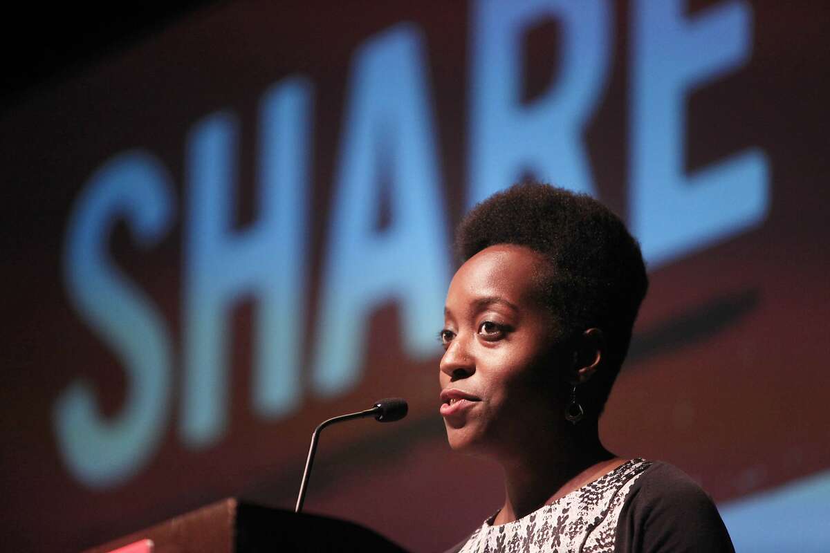 Milicent Johnson, Peers director of partnerships, speaks during the opening plenary at SHARE: Catalyzing the Sharing Economy on Tuesday, May 13, 2014 in San Francisco, Calif.
