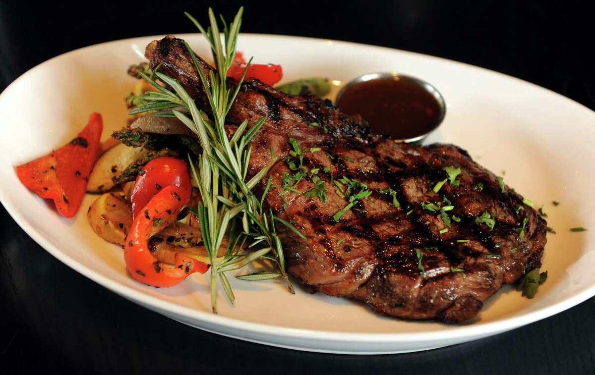 The Cowboy steak, a 16oz, bone-in rib chop, at POST 154, a new restaurant and bar, open in the former U.S. post office on Post Road in Westport, Conn.